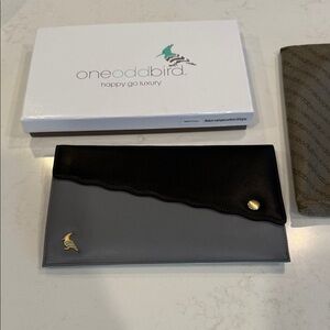 One Odd Bird Black and Gray Leather Clutch Purse